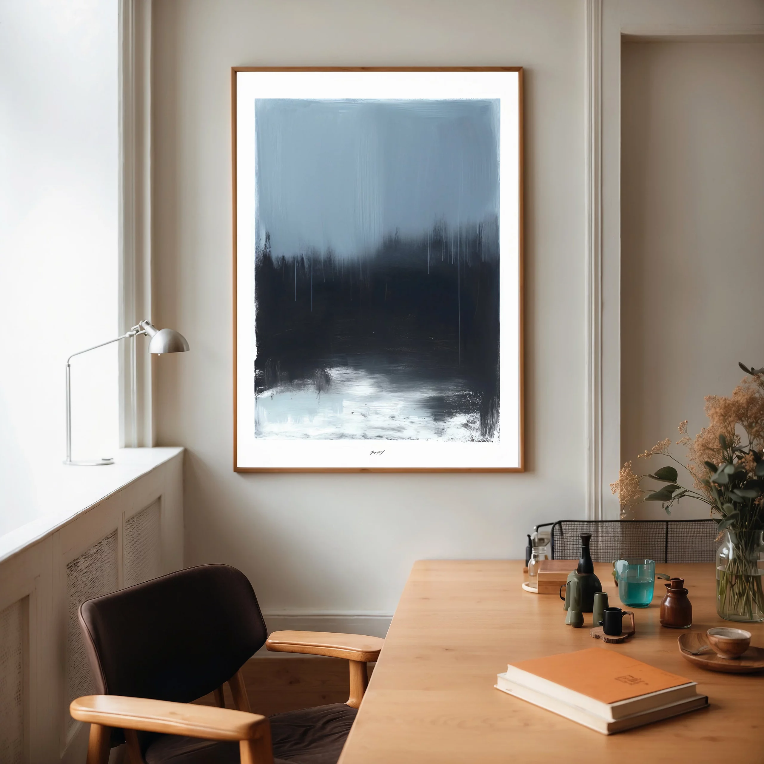 Minimalist black and blue abstract canvas art showing Nordic forest landscape in modern interior.