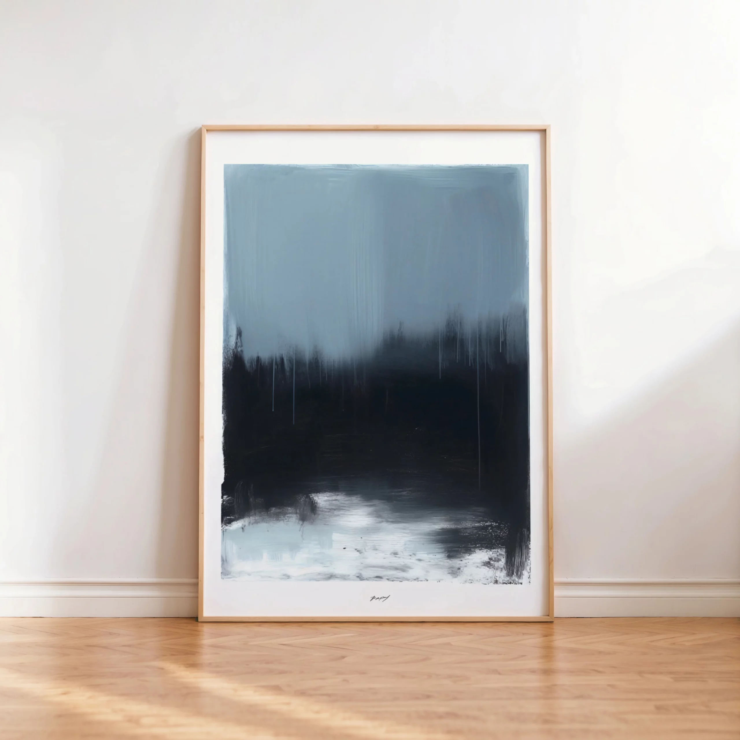 Abstract blue landscape artwork with dramatic foggy horizon in minimalist wooden frame.
