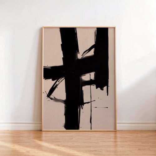 Abstract expressionist artwork with bold black brushstrokes on beige canvas in wooden frame.