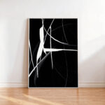 Modern black and white abstract art print with bold white brushstrokes on dark background.