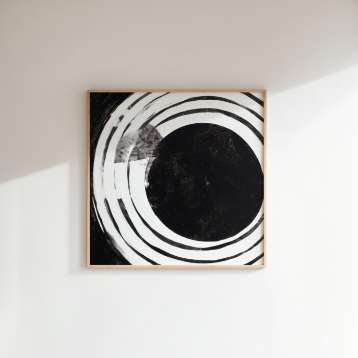 Minimalist black and white spiral artwork creating hypnotic vortex effect in wooden frame.