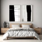 Minimalist bedroom with wooden bed frame and bold black and white abstract wall art.
