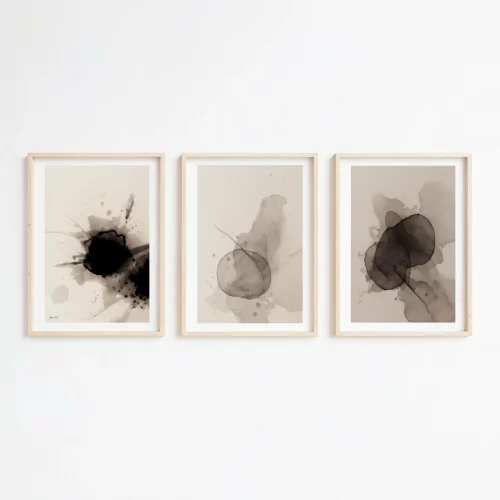 Minimalist black and gray ink triptych artwork with organic forms in natural frames.