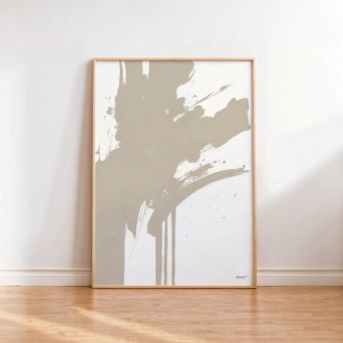 Minimalist abstract white brushstrokes on beige canvas with wooden frame against white wall.
