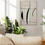Minimalist black line abstract artwork in bright living room with plants.