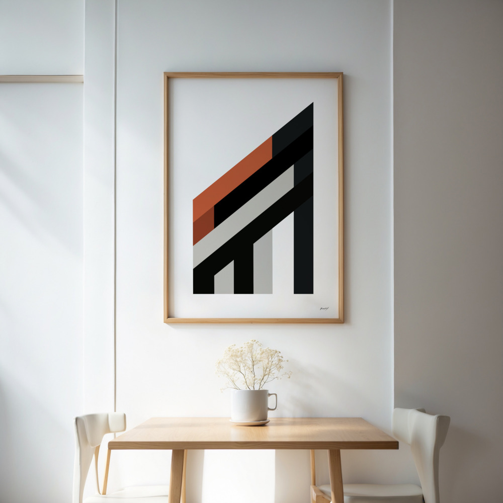 Minimalist geometric black and white abstract art with orange accent above wooden table