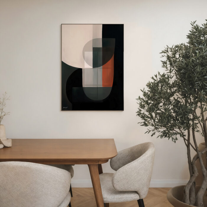 Abstract geometric wall art above mid-century table with cream chairs and indoor plant.
