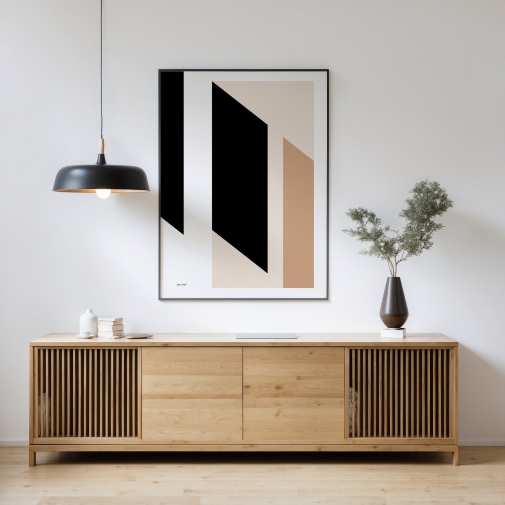 Minimal geometric abstract art above wooden console with pendant light and greenery