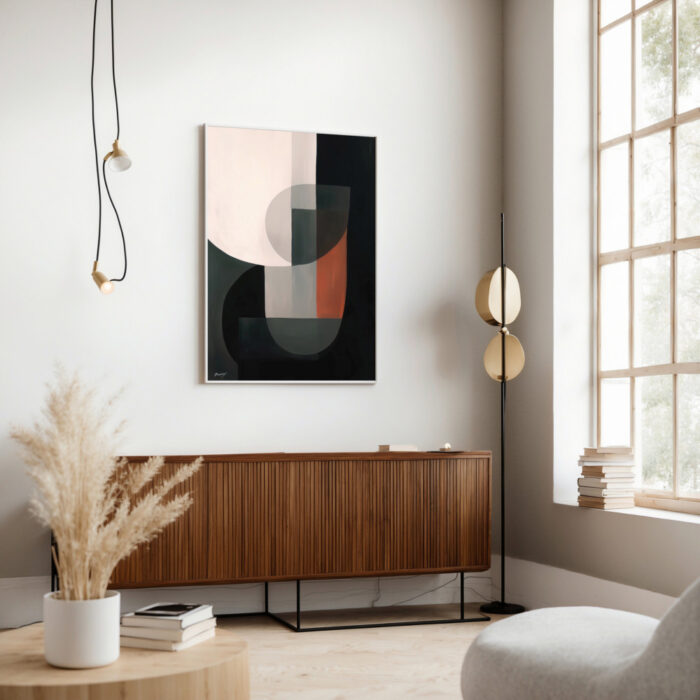 Minimalist living room with abstract geometric art above wooden credenza near sunny window.