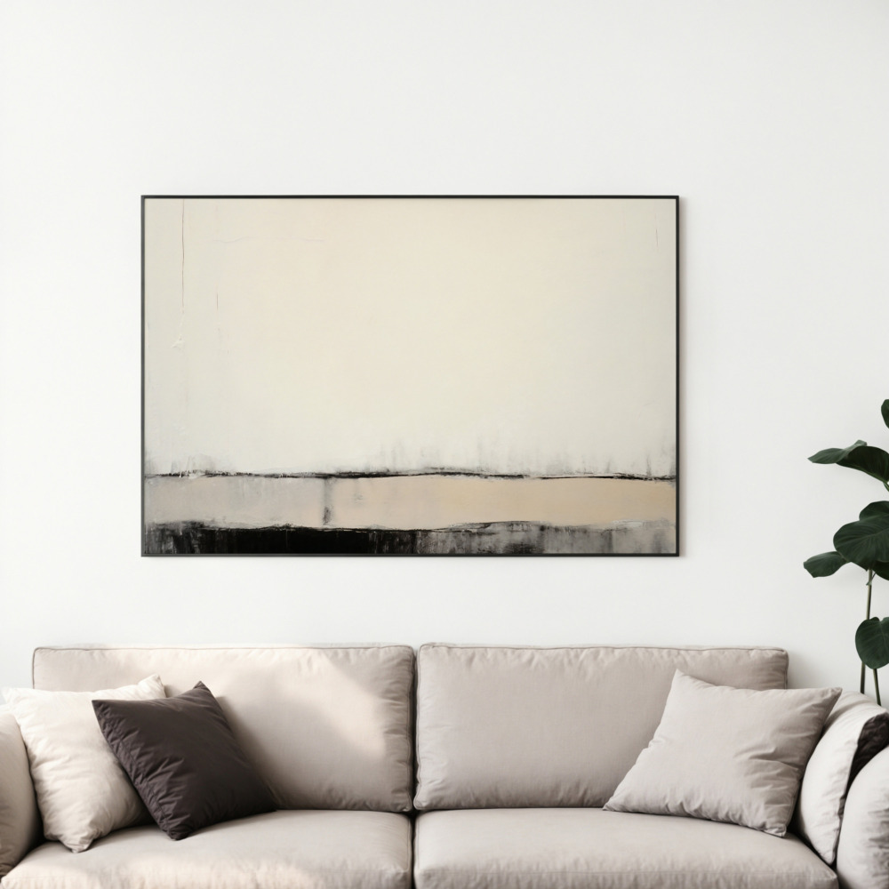 Minimalist abstract horizon painting in neutral tones displayed above beige sofa with decorative pillows.