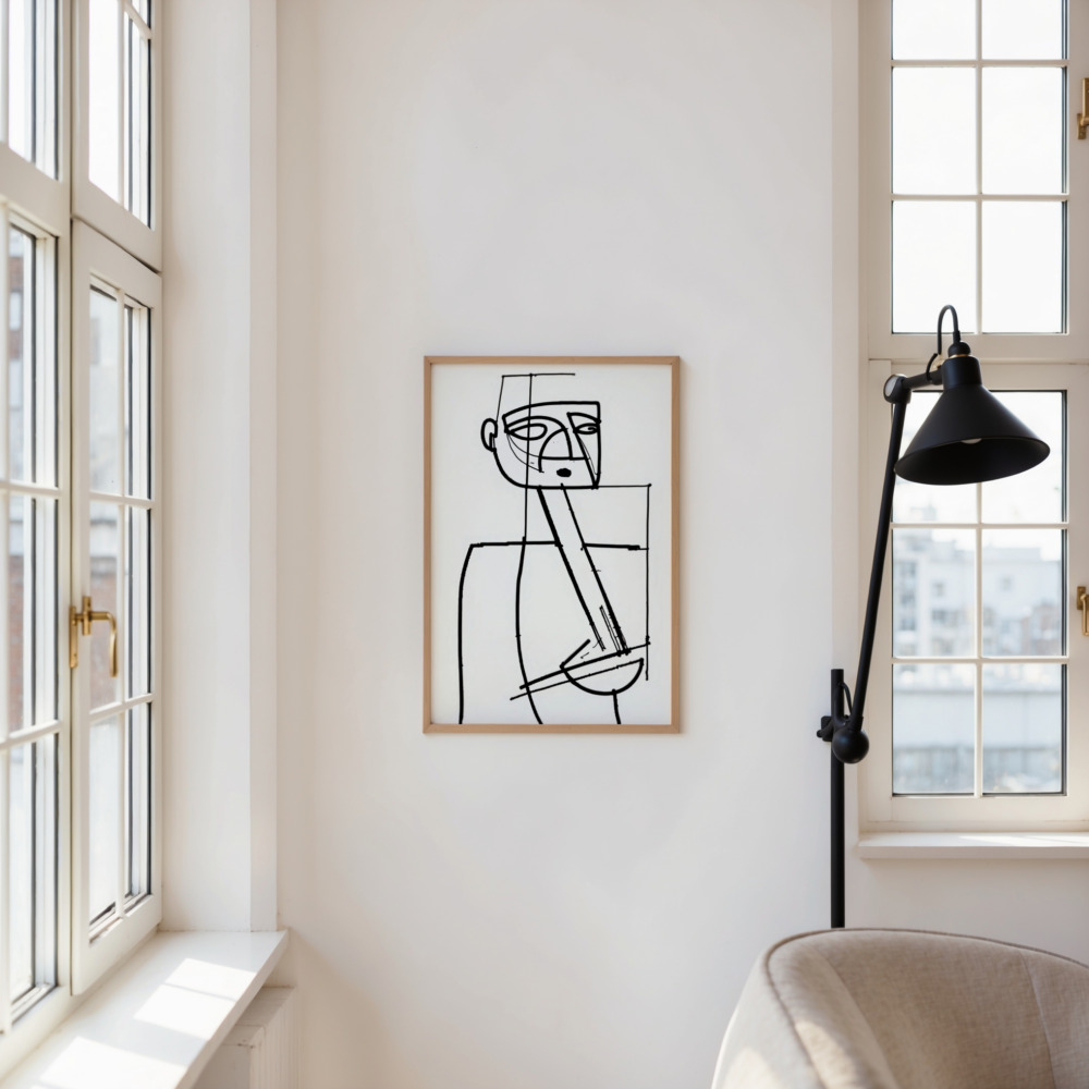 Minimalist black line portrait in bright white room with natural light and modern lamp.