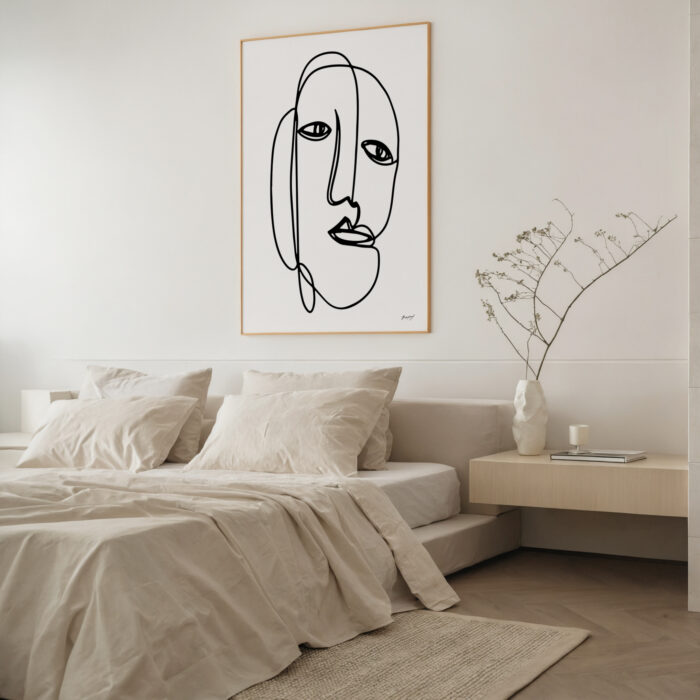 Minimalist single-line face artwork above neutral bed with floating nightstand and natural light.