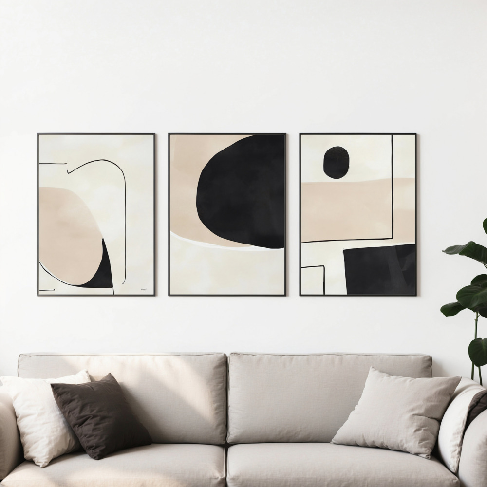 Modern abstract triptych with neutral colors over beige sofa in contemporary living space