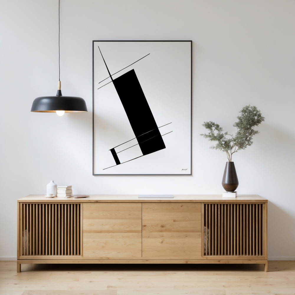 Modern wooden sideboard with black geometric artwork in minimalist living room setting.