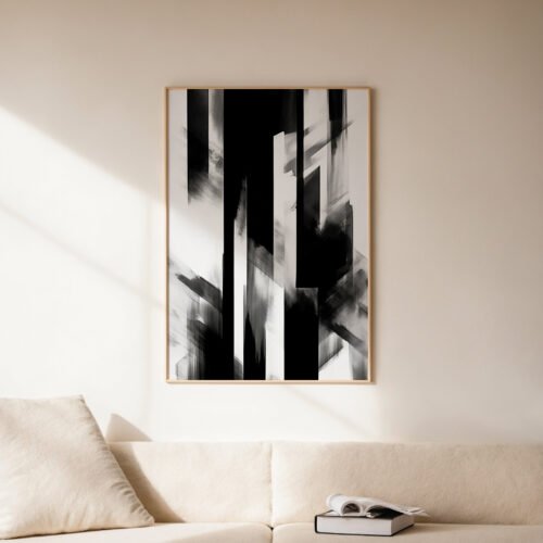 Black and white abstract artwork above cream sofa in minimalist living space.