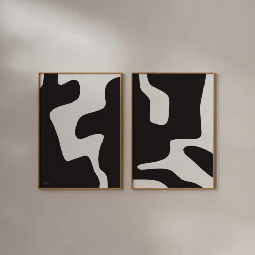 Abstract diptych artwork with flowing black organic shapes on white background in wooden frames.
