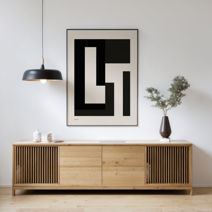 Minimalist wooden console with black and white geometric artwork and modern pendant light.