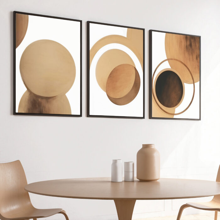 Abstract circle triptych in earth tones above minimalist round dining table.
