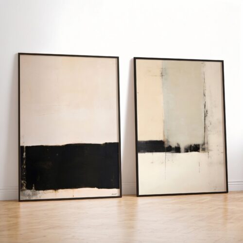 Two minimalist abstract paintings featuring black and beige color blocks leaning against white wall.