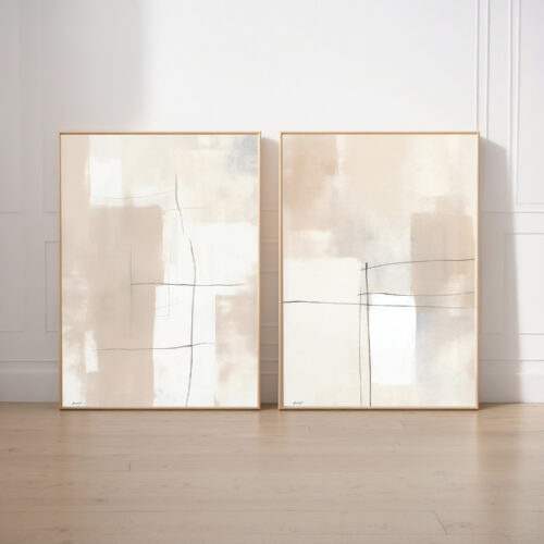 Minimalist neutral abstract art duo with geometric shapes leaning against white wall on wooden floor.
