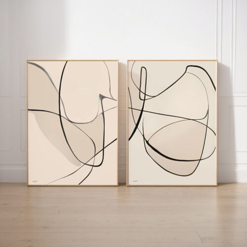 Abstract line art duo with flowing black curves on beige canvases against white wall.