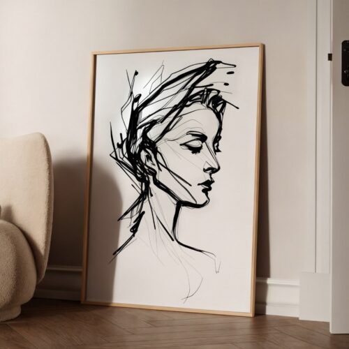 Minimalist black and white abstract figure sketch in elegant wooden frame against neutral wall.