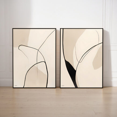 Abstract line art diptych in beige tones with black frames against white wall.