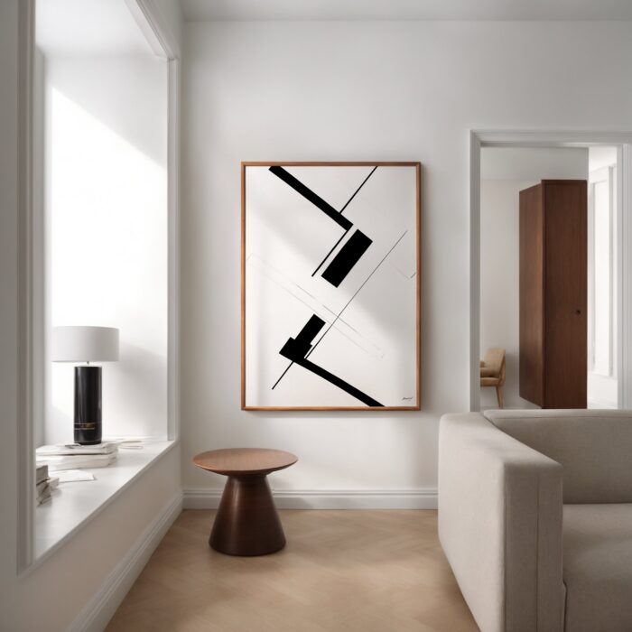 Modern minimalist living space with framed black geometric art and wooden stool.