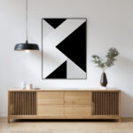 Modern geometric artwork above natural oak media console with minimalist styling