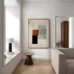 Minimalist living room with abstract wall art and wooden accent stool.