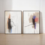 Elegant abstract pair: black brushstrokes on white with soft color accents in modern frames.