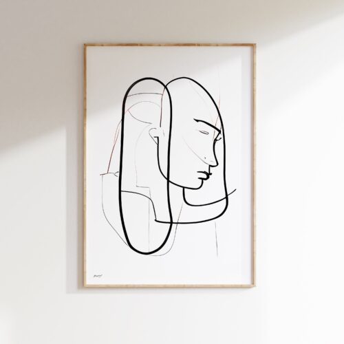 Black and white minimalist line drawing portrait in wooden frame on white wall.