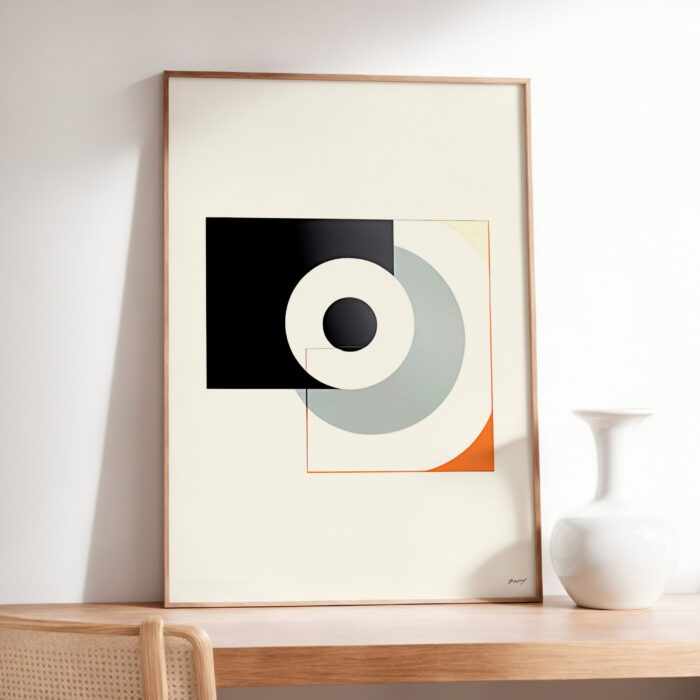 Minimalist geometric abstract print with black square and gray circle in wooden frame.