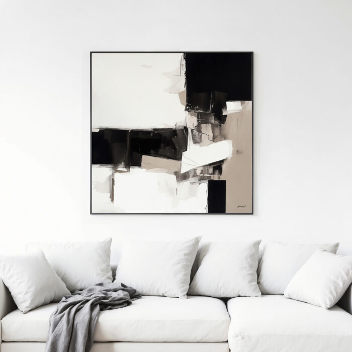 Bold abstract black and white painting above white sofa with matching throw pillows.