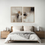 Minimal abstract diptych artwork in beige and black above contemporary platform bed