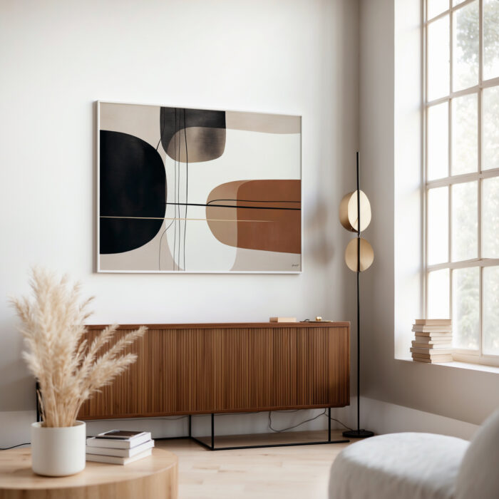 Abstract geometric wall art above wooden credenza in modern minimalist living room.