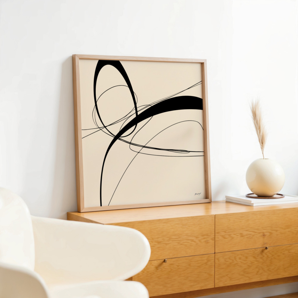 Minimalist black brushstroke art on wooden console with decorative vase