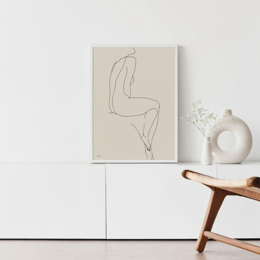 Minimalist line drawing of female figure displayed in neutral white modern home setting.