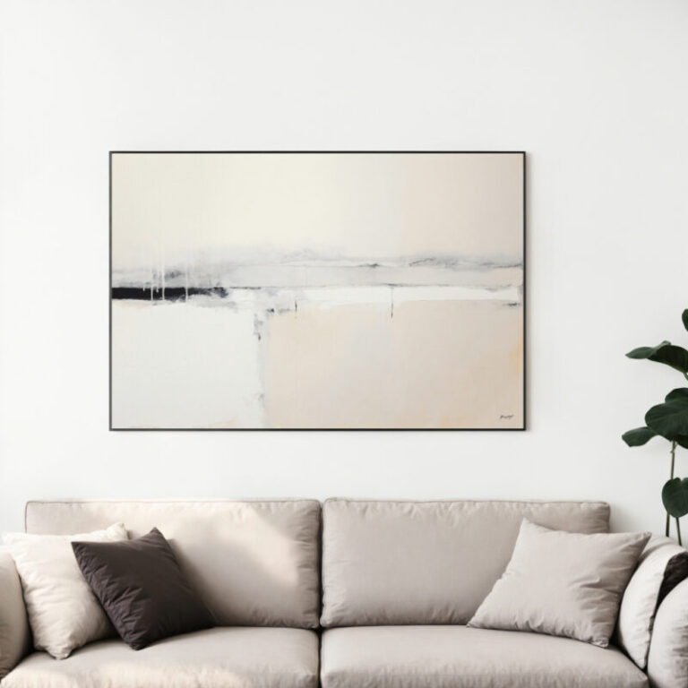 Minimalist abstract landscape painting in neutral tones above beige sofa with plant accent.
