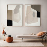 Abstract geometric artwork above minimalist daybed with terracotta accents in neutral living space