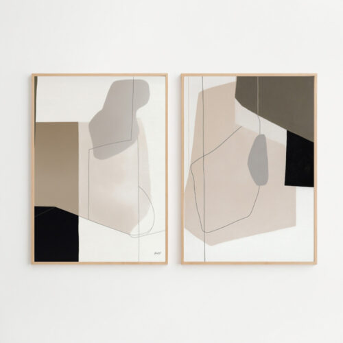Abstract geometric diptych with organic beige, cream and black shapes in wooden frames.