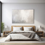 Minimalist bedroom with wooden bed frame, white bedding, and abstract wall art.
