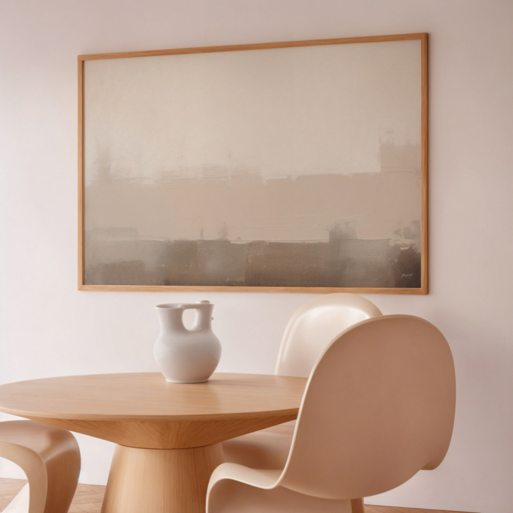 Minimalist dining area with abstract landscape artwork, wooden table, and contemporary chair.