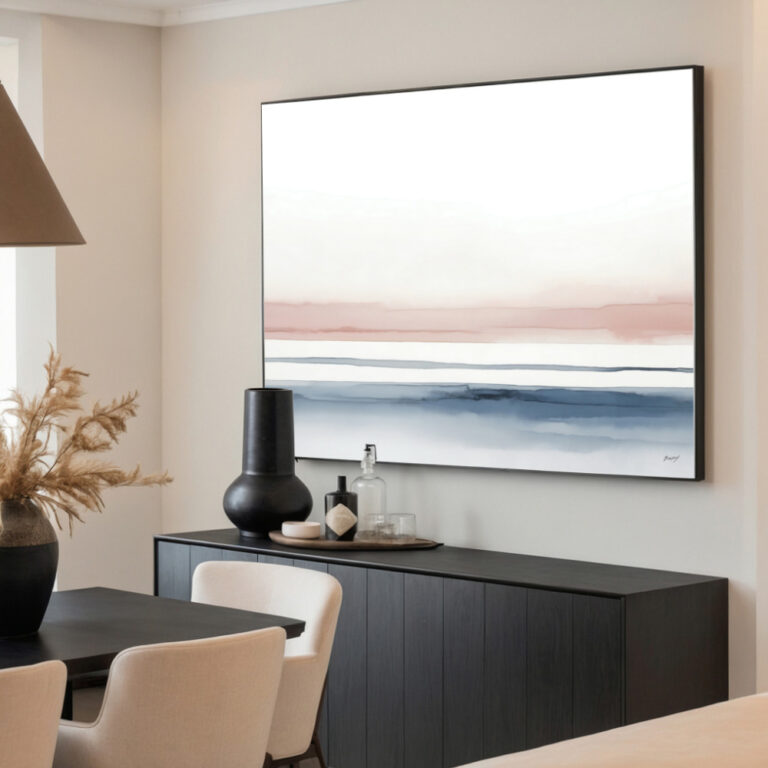 Abstract landscape artwork displayed above black credenza in elegant neutral interior.