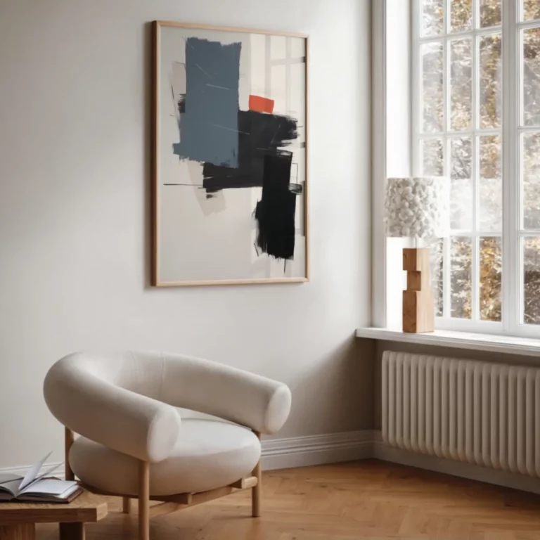 Minimalist living room featuring abstract geometric art and mid-century modern armchair.