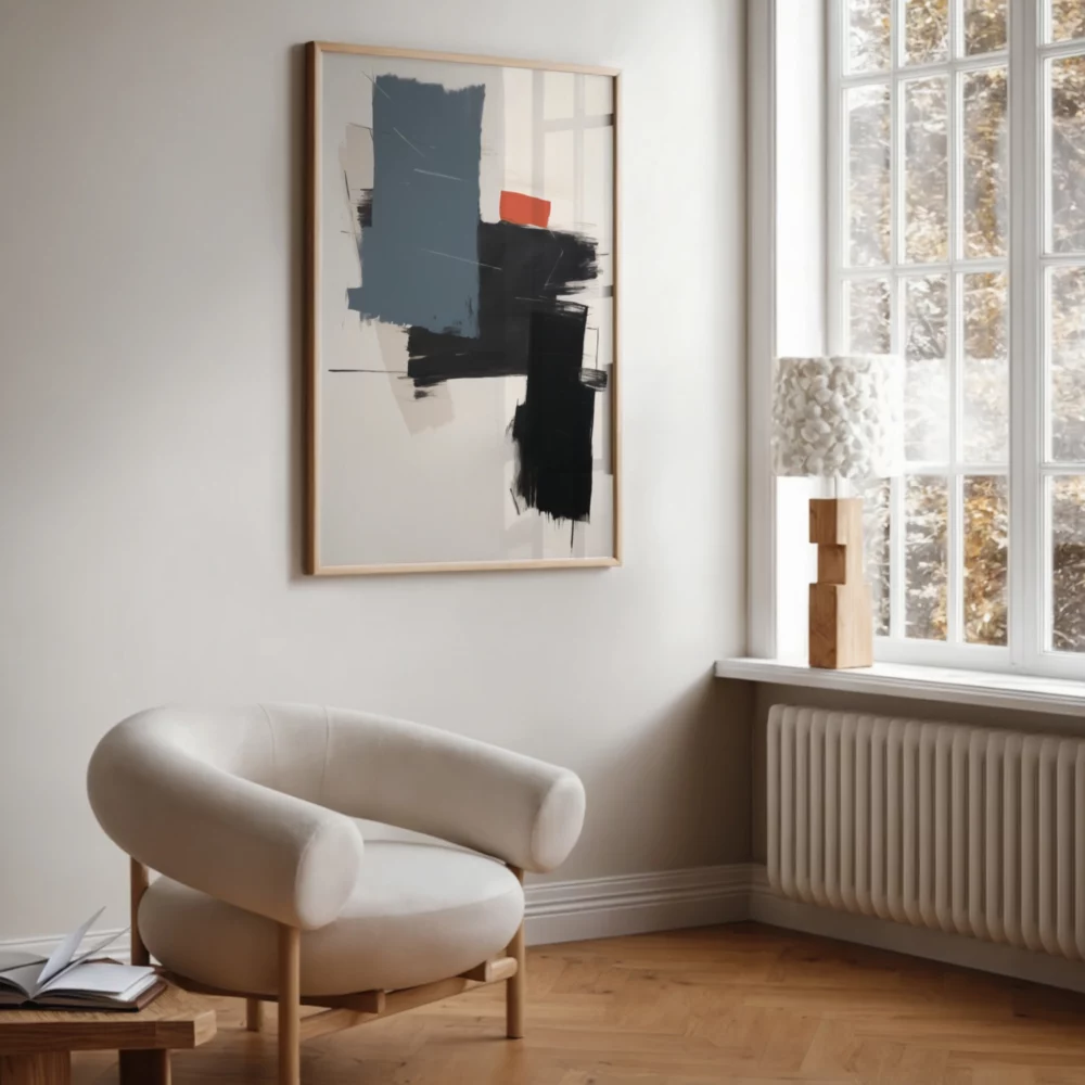 Minimalist living room featuring abstract geometric art and mid-century modern armchair.
