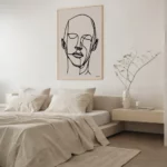 Minimalist bedroom with elegant line art portrait above neutral bedding.