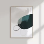Framed abstract artwork with organic shapes in forest green and delicate black lines.