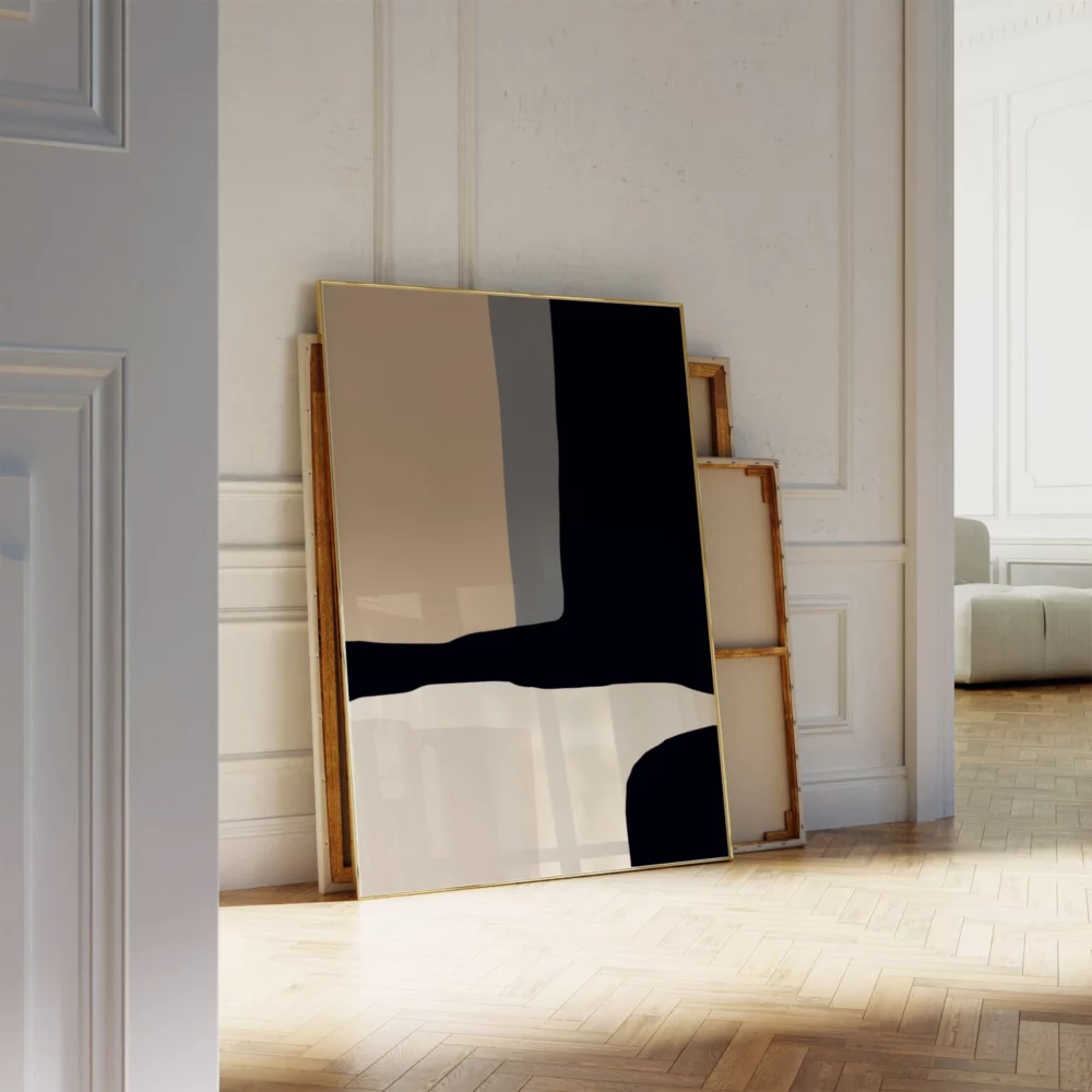 Minimalist geometric abstract painting leaning against white wall in stylish interior.