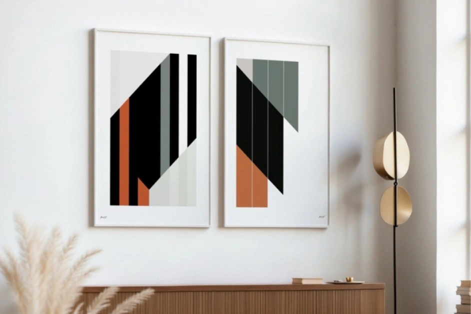 Modern abstract diptych wall art with geometric patterns above wooden console.